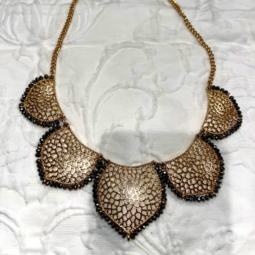 Gold and dark silver lace-like necklace
